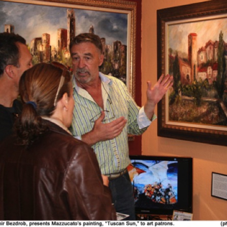 Gallery owner, Emir Bezdrob, presents 'Tuscan Sun' to art patrons. Gallery owner, Emir Bezdrob, presents 'Tuscan Sun' to art patrons.